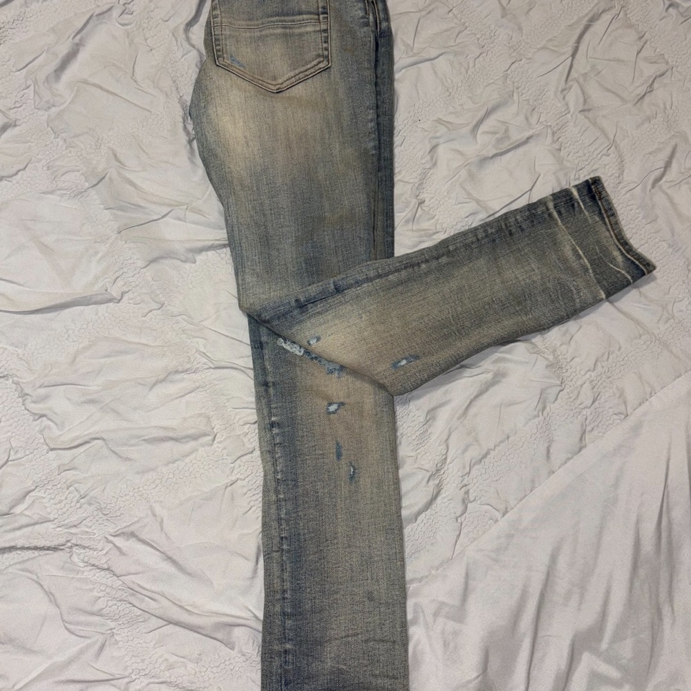 AMIRI Faded Blue Distressed Jeans